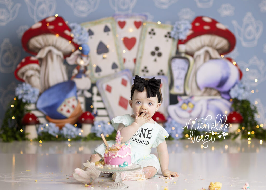Alice in ONEderland cake smash

first birthday photography ideas

whimsical cake smash session

themed baby photoshoot inspiration

one year old photo ideas

wonderland birthday photo shoot

baby girl cake smash outfits

best cake smash photographers [insert city/region]